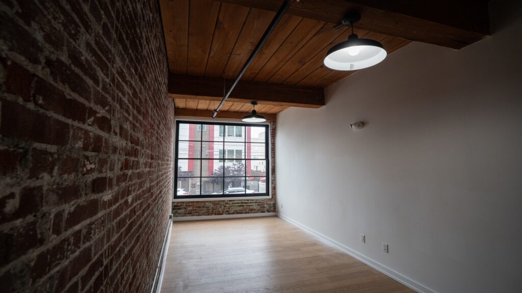 Private room with brick walls in a coworking space
